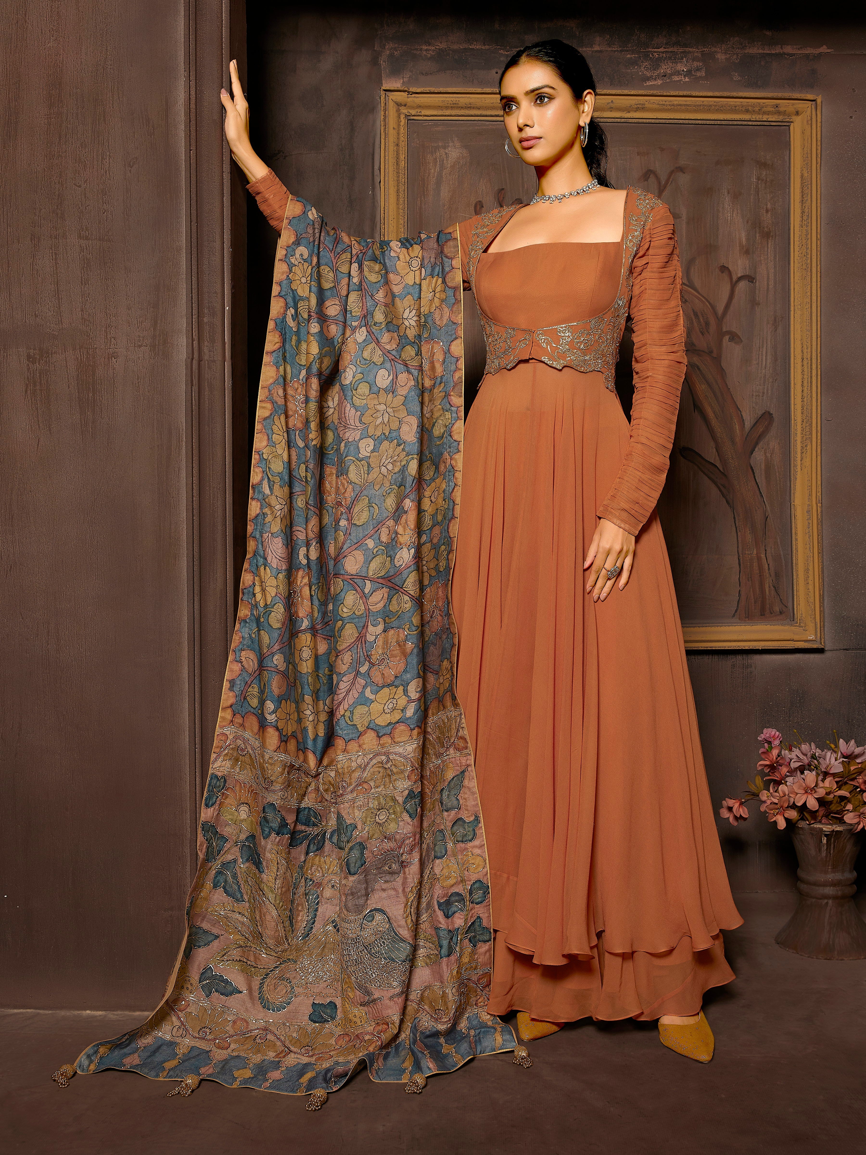 Rustic Orange Pure Georgette Gown with Flairy Palazzo and Klamkari Handwork Dupatta