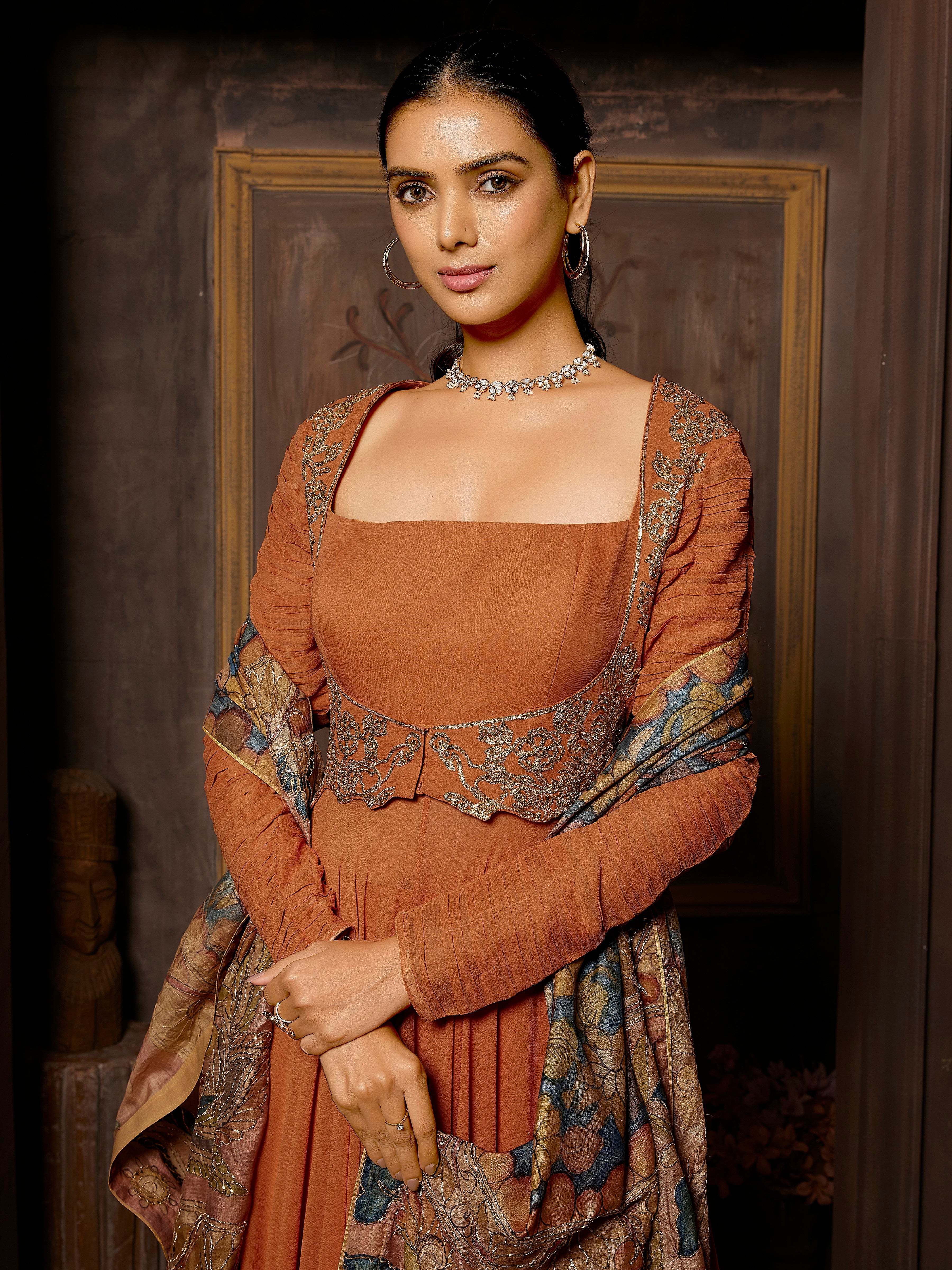 Rustic Orange Pure Georgette Gown with Flairy Palazzo and Klamkari Handwork Dupatta