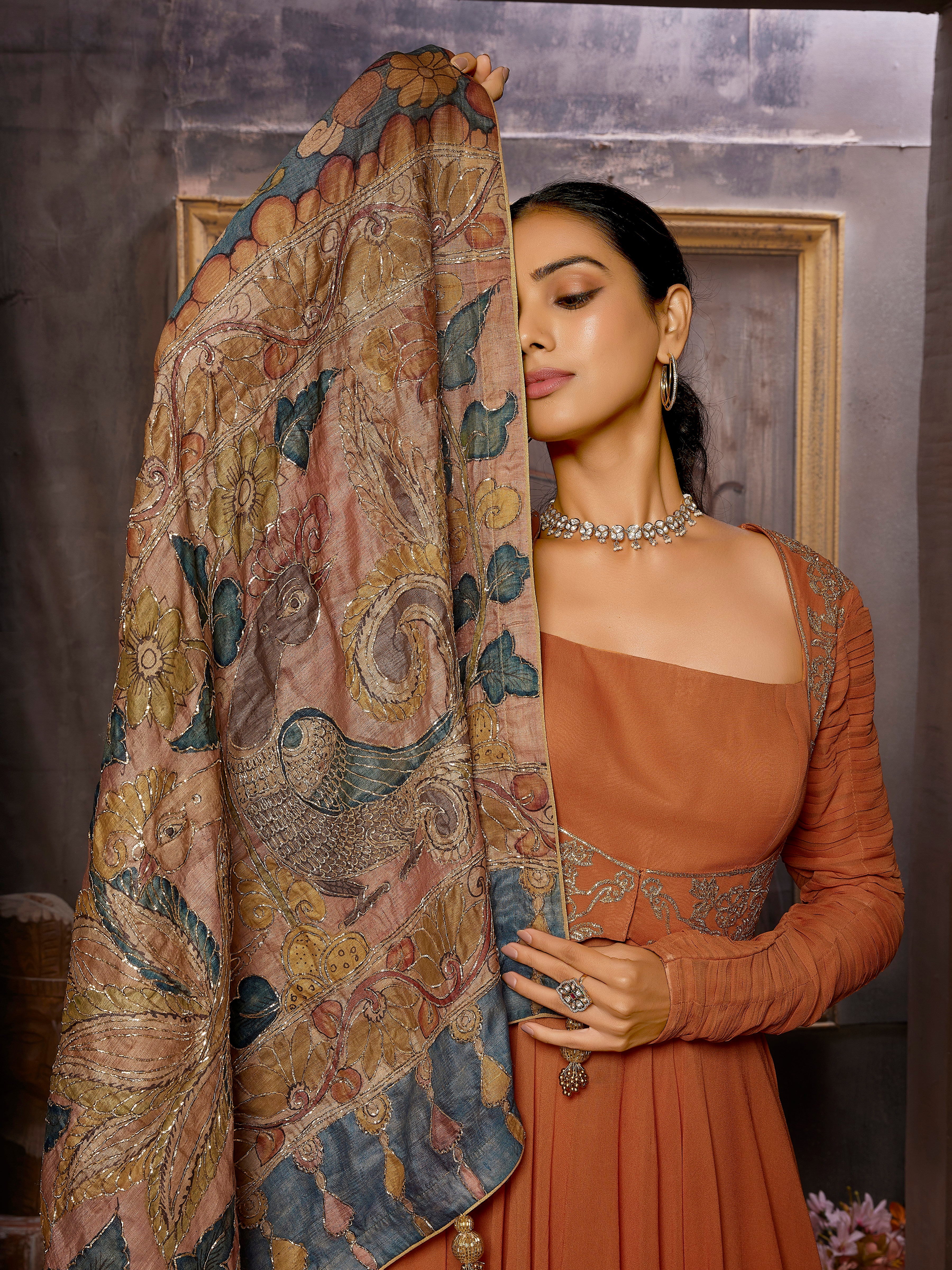Rustic Orange Pure Georgette Gown with Flairy Palazzo and Klamkari Handwork Dupatta